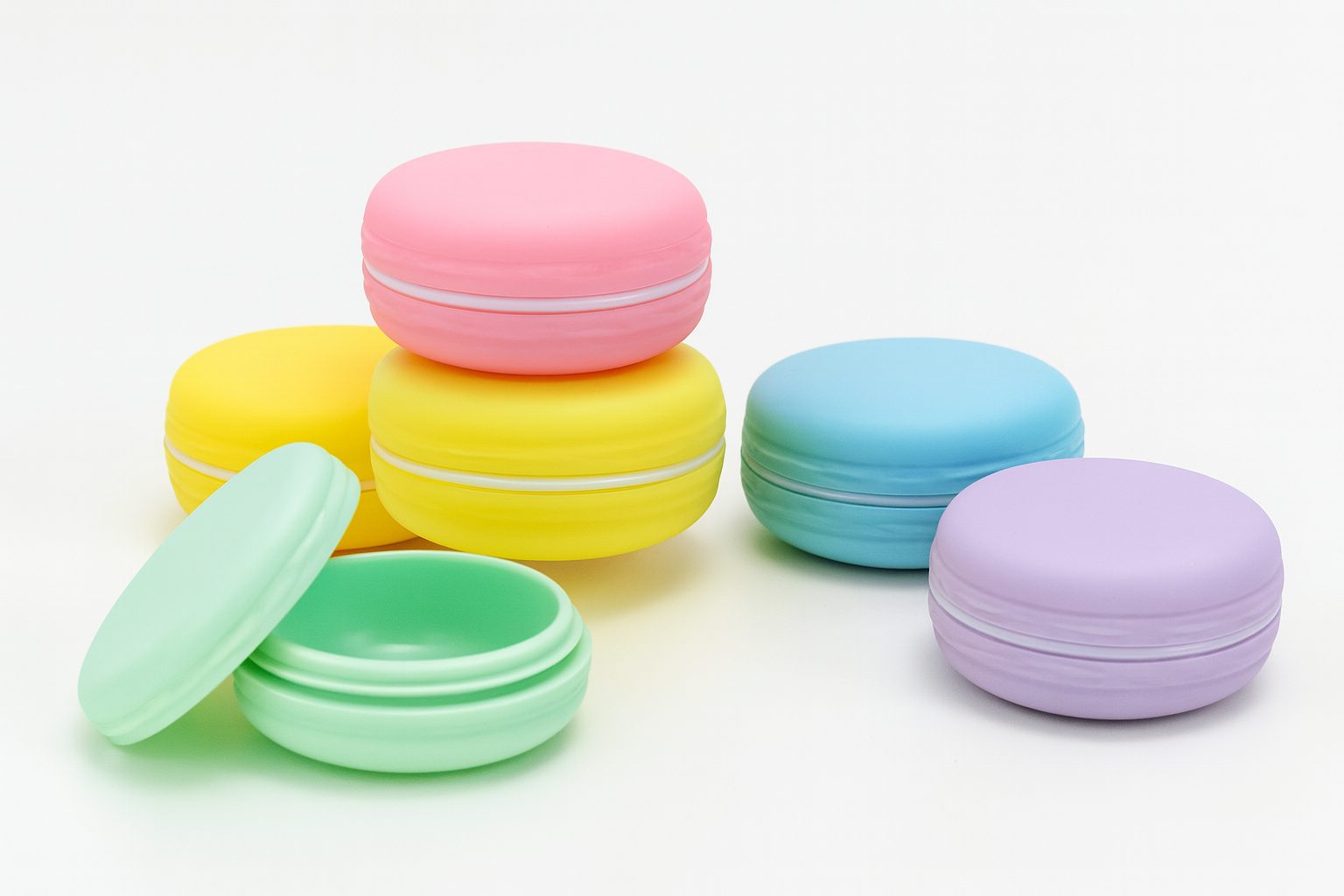envases cosméticos tipo macaron en colores pastel para mini cremas y bálsamos